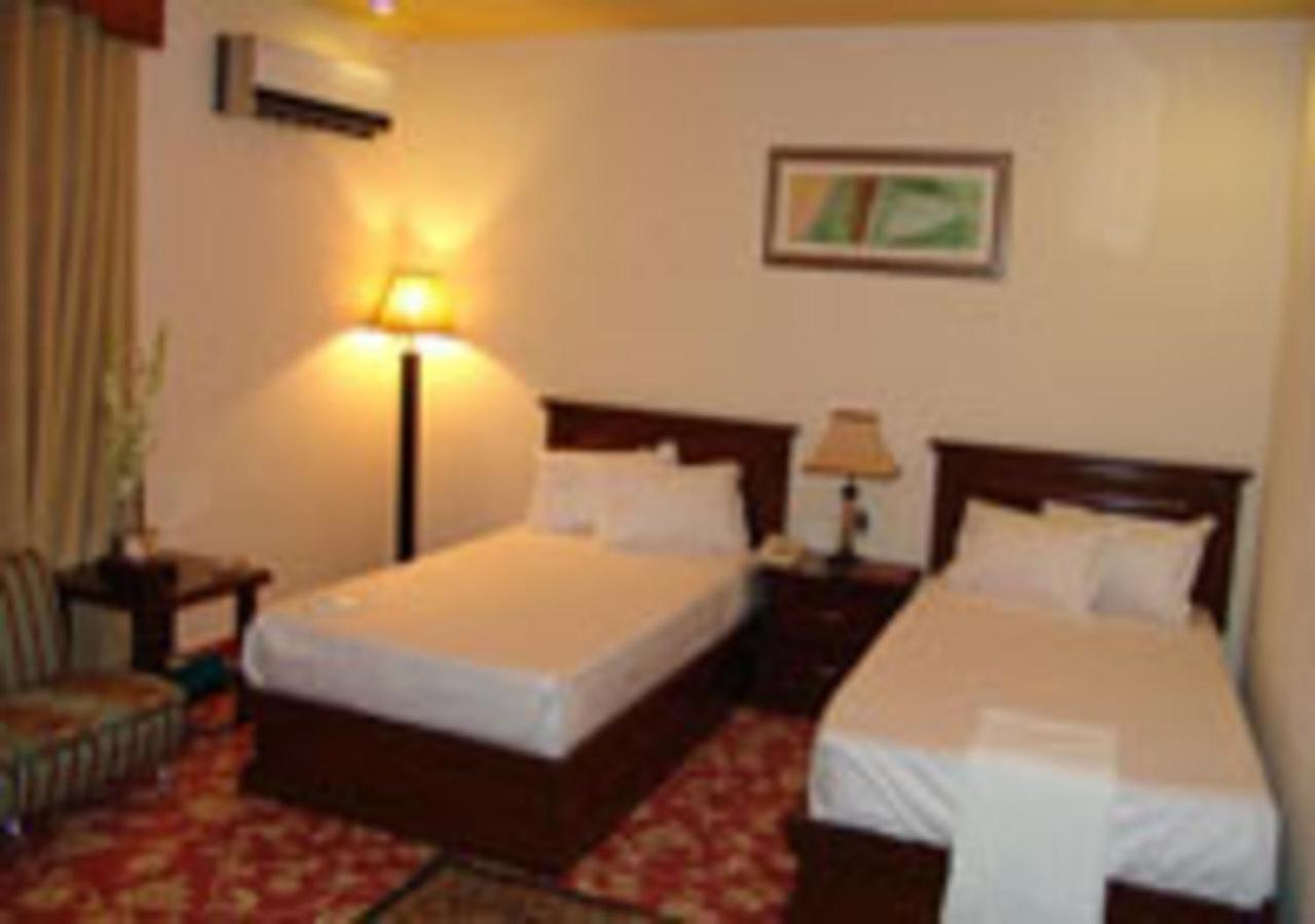 Rajone Hotel Faisalabad Exterior photo